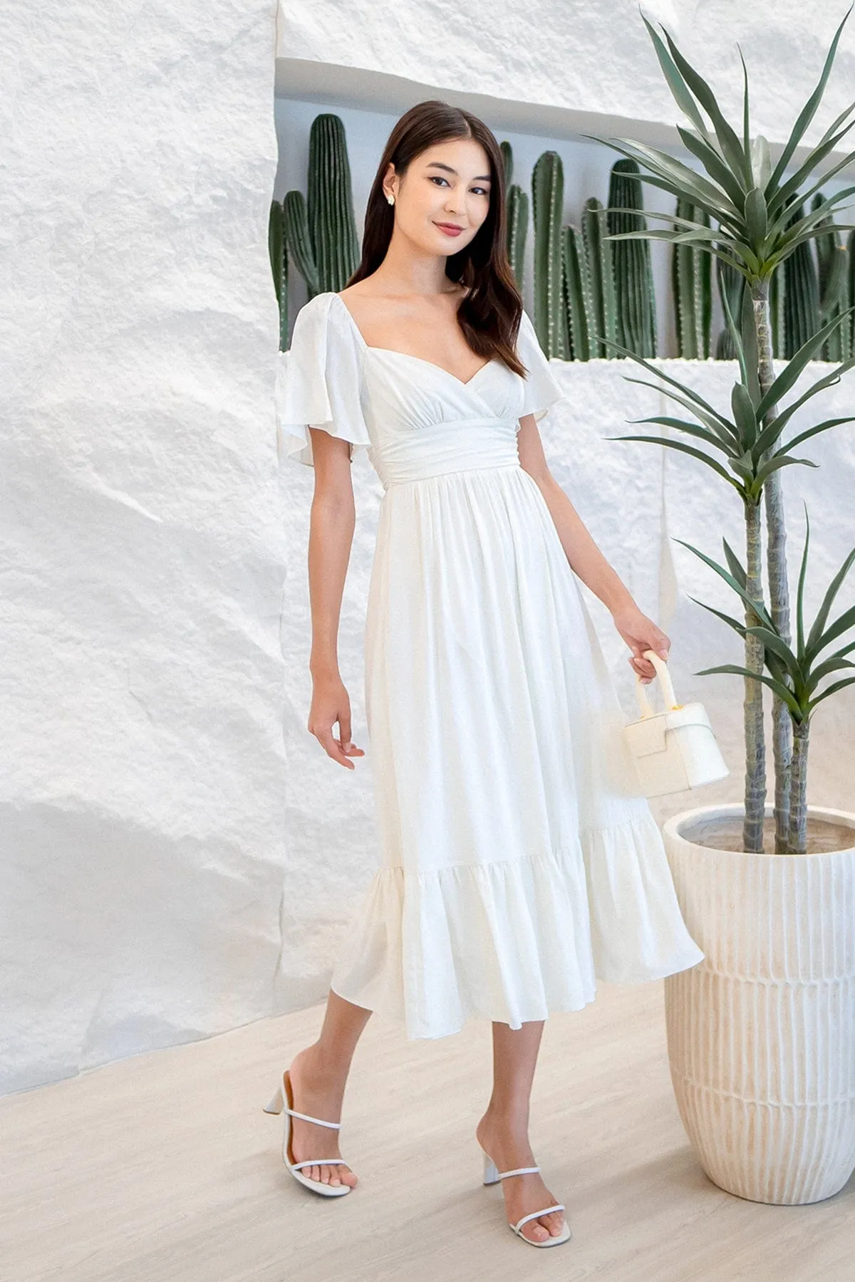 CECE FLUTTERS MAXI DRESS IN CREAM WHITE